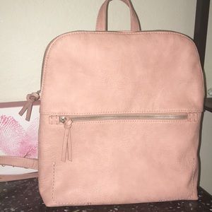 Vegan leather super cute backpack.